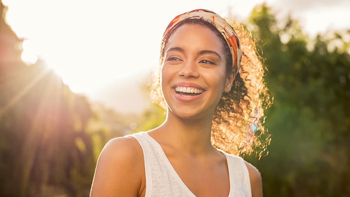 Smiling woman at Sunset