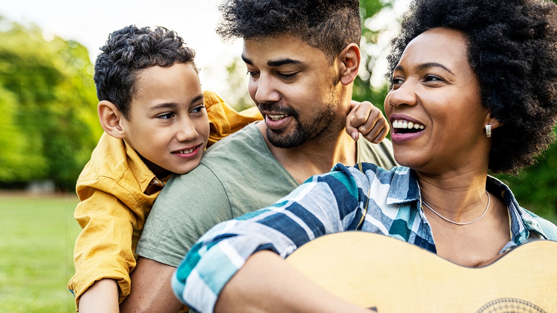 Family Singing with a Guitar