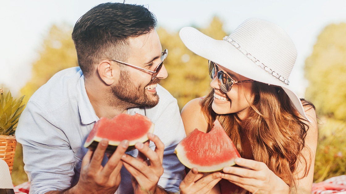 Fun Couple Eating Watermelon